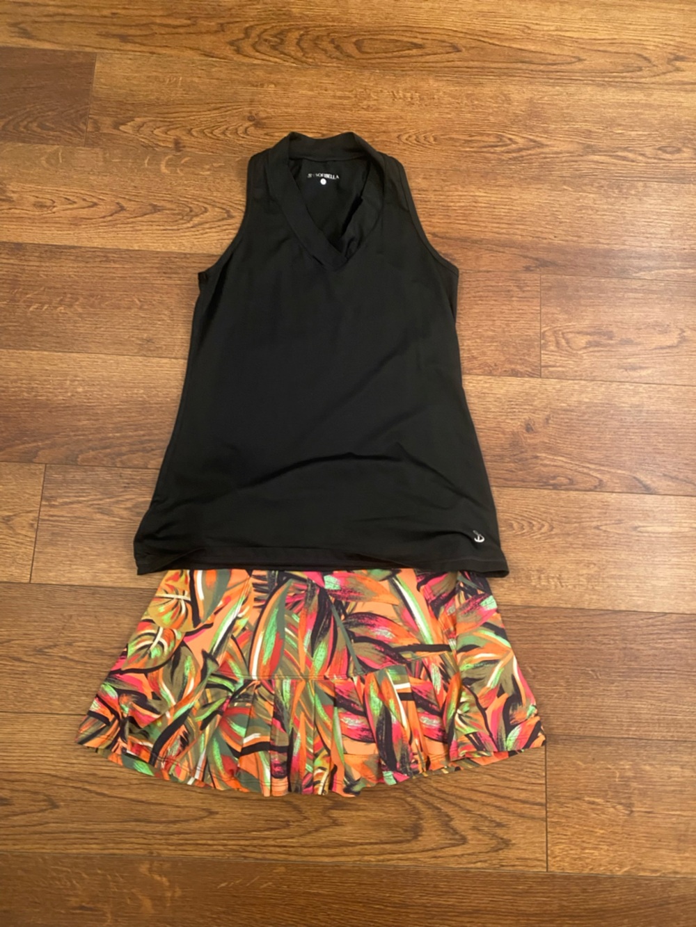 Black Sleeveless V-Neck Top with Tropical Print Skirt (tennis)